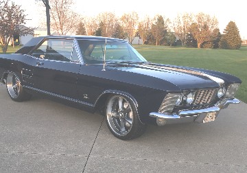 dark blue 1963 Buick Riviera